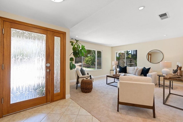 1740 Fire Mountain Dr, Oceanside, CA 92054 - entryway with light carpet, light tile patterned floors, and recessed lighting