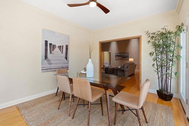 1740 Fire Mountain Dr, Oceanside, CA 92054 - dining space featuring light wood-style floors, a ceiling fan, and crown molding