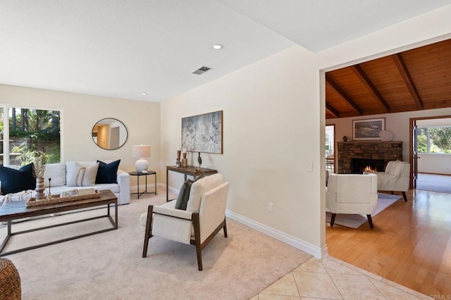 1740 Fire Mountain Dr, Oceanside, CA 92054 - living room with light tile patterned floors, recessed lighting, light carpet, a fireplace, and wood ceiling