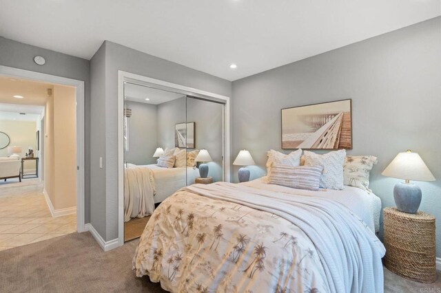 1740 Fire Mountain Dr, Oceanside, CA 92054 - carpeted bedroom featuring a closet, recessed lighting, and tile patterned flooring