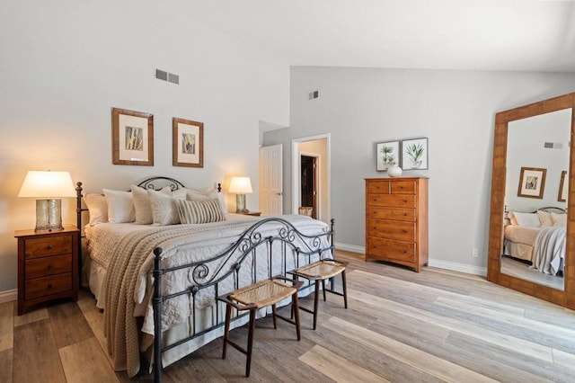 1740 Fire Mountain Dr, Oceanside, CA 92054 - bedroom featuring light wood-style flooring and high vaulted ceiling