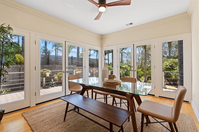 1740 Fire Mountain Dr, Oceanside, CA 92054 - sunroom / solarium with french doors, wood finished floors, and crown molding