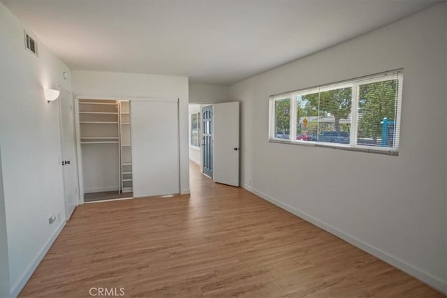 1138 N Valley St, Burbank, CA 91505 - unfurnished bedroom with wood finished floors and a closet