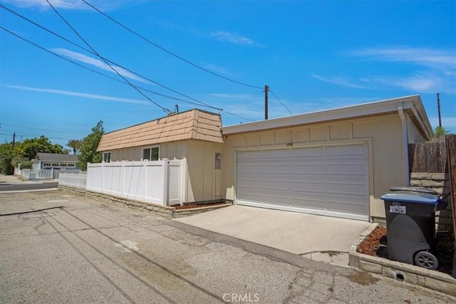 1138 N Valley St, Burbank, CA 91505 - view of front of property featuring a garage and board and batten siding