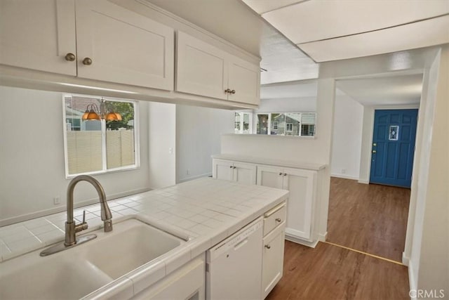 1138 N Valley St, Burbank, CA 91505 - kitchen featuring tile counters, dishwasher, white cabinetry, and wood finished floors