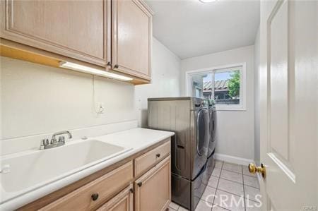 14213 Aliso Ct, Chino Hills, CA 91709 - laundry area with washer and dryer, cabinet space, and light tile patterned floors