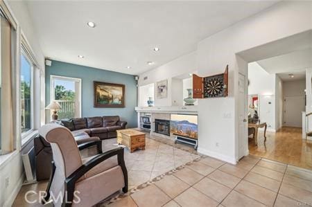 14213 Aliso Ct, Chino Hills, CA 91709 - living area featuring light tile patterned floors, a fireplace, and recessed lighting