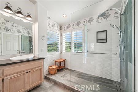 14213 Aliso Ct, Chino Hills, CA 91709 - full bath featuring vanity, an enclosed shower, and wallpapered walls