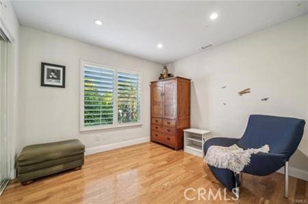 14213 Aliso Ct, Chino Hills, CA 91709 - sitting room with light wood finished floors and recessed lighting
