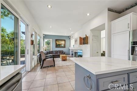 14213 Aliso Ct, Chino Hills, CA 91709 - kitchen with gray cabinetry, light countertops, dishwasher, light tile patterned floors, and recessed lighting