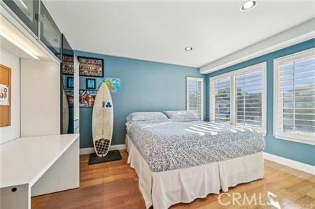 14213 Aliso Ct, Chino Hills, CA 91709 - bedroom featuring wood finished floors and recessed lighting