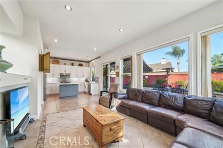 14213 Aliso Ct, Chino Hills, CA 91709 - living area with plenty of natural light, light tile patterned floors, and recessed lighting