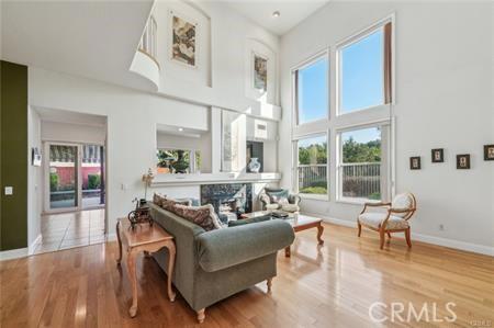 14213 Aliso Ct, Chino Hills, CA 91709 - living area with a towering ceiling and wood finished floors