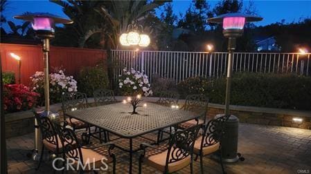 14213 Aliso Ct, Chino Hills, CA 91709 - patio at twilight featuring outdoor dining area and a patio area