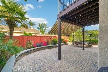 14213 Aliso Ct, Chino Hills, CA 91709 - fenced backyard with a patio area and outdoor dining area