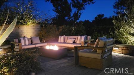 14213 Aliso Ct, Chino Hills, CA 91709 - patio at twilight with a patio area and an outdoor living space with a fire pit