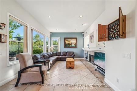 14213 Aliso Ct, Chino Hills, CA 91709 - living area with a fireplace, light tile patterned floors, and recessed lighting