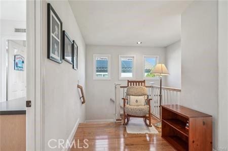 14213 Aliso Ct, Chino Hills, CA 91709 - sitting room with wood finished floors and baseboards
