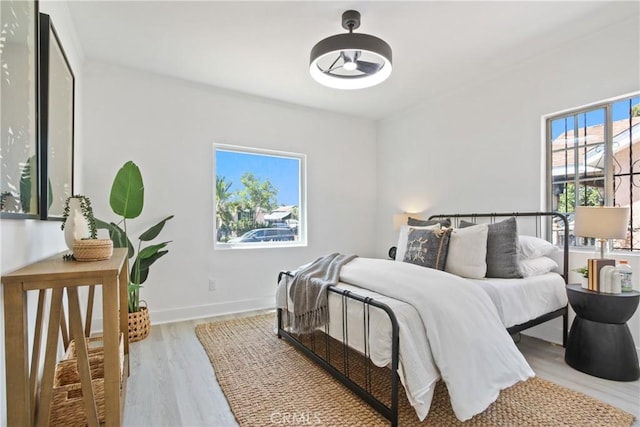 215 E 107th St, Los Angeles, CA 90003 - bedroom with wood finished floors and baseboards