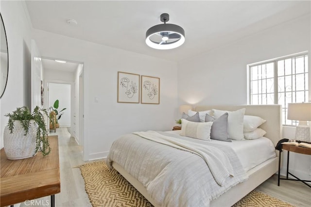215 E 107th St, Los Angeles, CA 90003 - bedroom featuring light wood finished floors