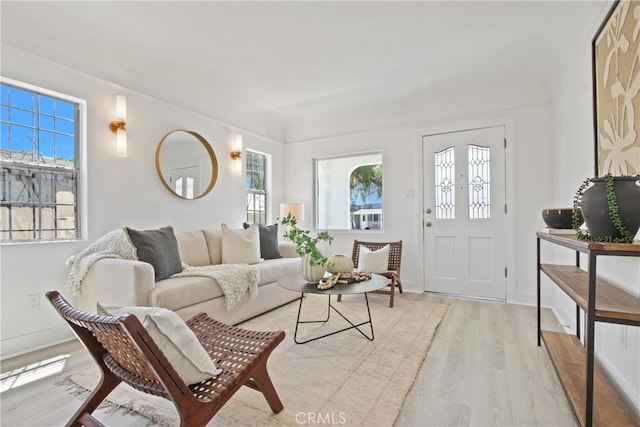 215 E 107th St, Los Angeles, CA 90003 - living area featuring light wood-style floors