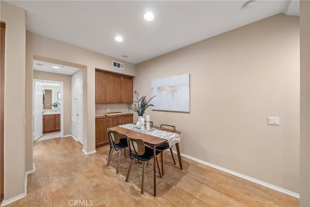 118 Vintage Unit 18, Irvine, CA 92620 - dining room with light wood finished floors and recessed lighting