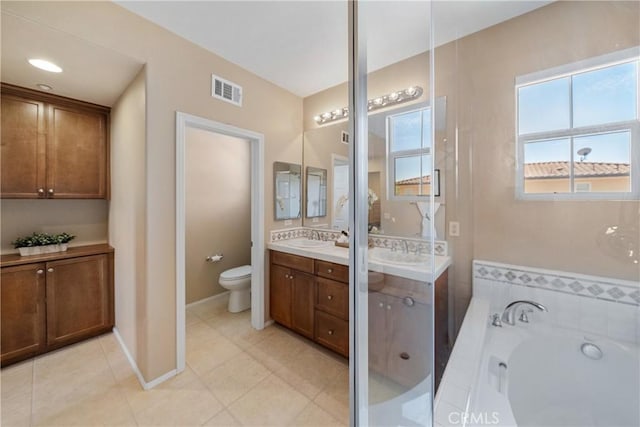 118 Vintage Unit 18, Irvine, CA 92620 - full bath featuring vanity, a garden tub, and tile patterned flooring
