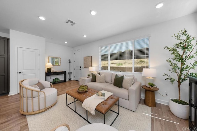 766 Makani St Unit 1, Chula Vista, CA 91911 - living area with light wood-type flooring and recessed lighting