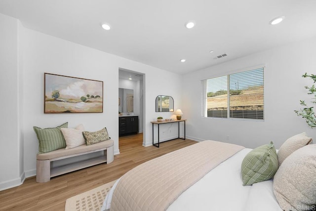 766 Makani St Unit 1, Chula Vista, CA 91911 - bedroom with light wood-style floors, recessed lighting, and ensuite bath