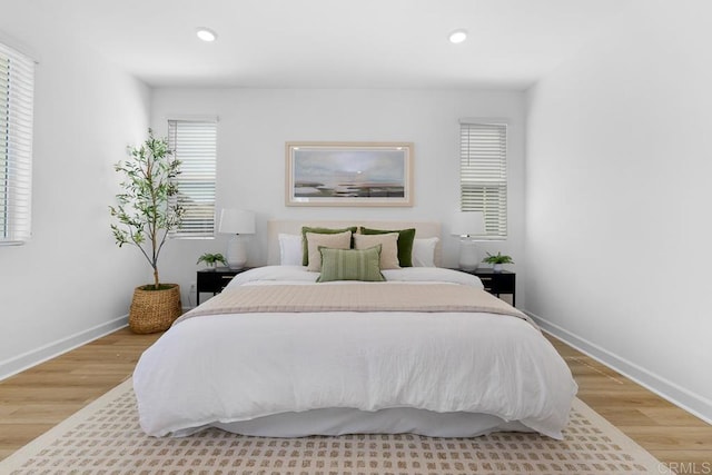 766 Makani St Unit 1, Chula Vista, CA 91911 - bedroom featuring multiple windows, light wood-type flooring, and recessed lighting