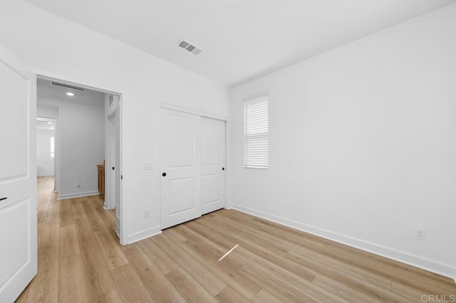 766 Makani St Unit 1, Chula Vista, CA 91911 - unfurnished bedroom featuring light wood-style floors and a closet