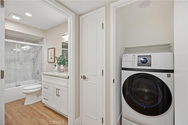 4025 Calle Sonora Este Unit 2C, Laguna Woods, CA 92637 - laundry area with washer / clothes dryer and light wood-type flooring