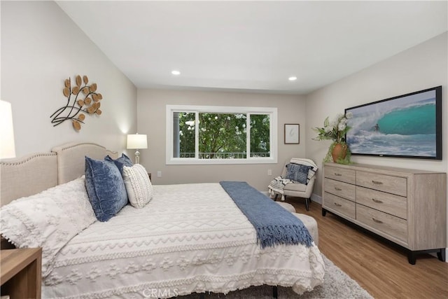 4025 Calle Sonora Este Unit 2C, Laguna Woods, CA 92637 - bedroom with wood finished floors and recessed lighting