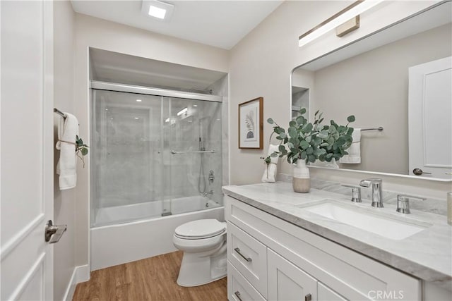 4025 Calle Sonora Este Unit 2C, Laguna Woods, CA 92637 - bathroom featuring vanity, wood finished floors, and enclosed tub / shower combo