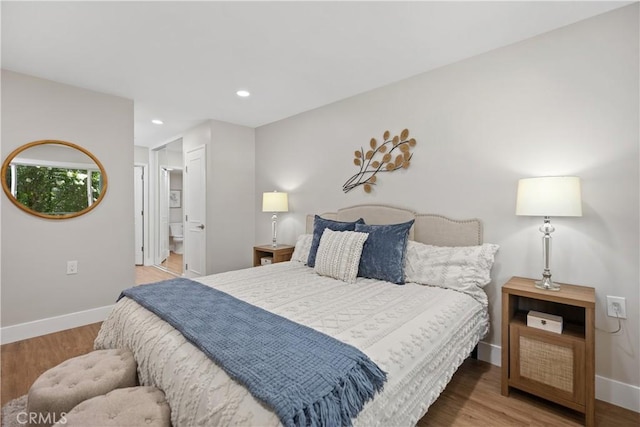 4025 Calle Sonora Este Unit 2C, Laguna Woods, CA 92637 - bedroom featuring wood finished floors, recessed lighting, and ensuite bath