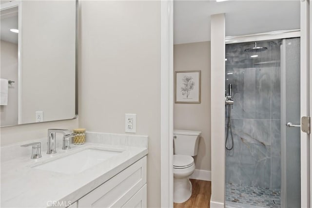 4025 Calle Sonora Este Unit 2C, Laguna Woods, CA 92637 - full bathroom featuring a marble finish shower, vanity, and wood finished floors