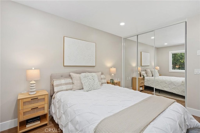 4025 Calle Sonora Este Unit 2C, Laguna Woods, CA 92637 - bedroom with a closet, wood finished floors, and recessed lighting
