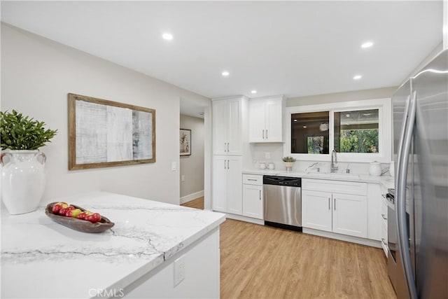 4025 Calle Sonora Este Unit 2C, Laguna Woods, CA 92637 - kitchen featuring appliances with stainless steel finishes, light wood-style floors, white cabinetry, and recessed lighting