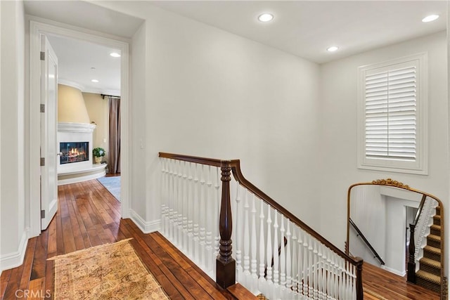 15 Pisano St, Ladera Ranch, CA 92694 - hallway with an upstairs landing, dark wood-style flooring, and recessed lighting