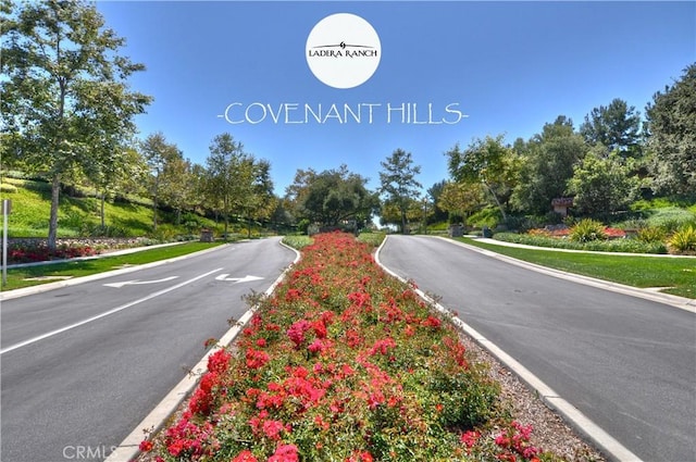 15 Pisano St, Ladera Ranch, CA 92694 - view of asphalt street with curbs, view of scattered trees, and sidewalks