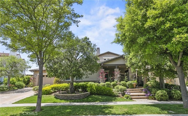 15 Pisano St, Ladera Ranch, CA 92694 - obstructed view of property with driveway, a porch, and a garage