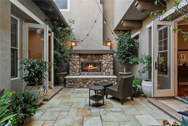 15 Pisano St, Ladera Ranch, CA 92694 - view of patio / terrace with an outdoor stone fireplace