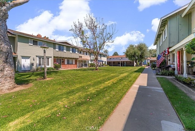 19859 Claremont Ln, Huntington Beach, CA 92646 - view of home's community with a residential view and a yard