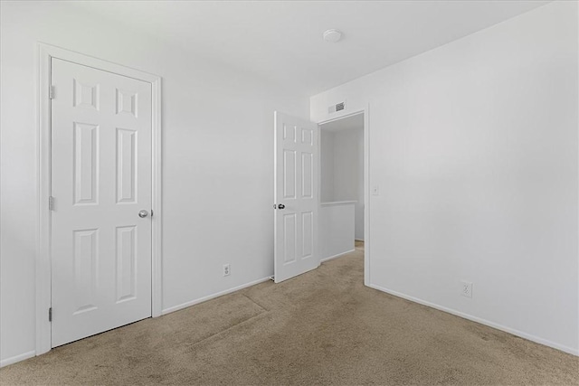 19859 Claremont Ln, Huntington Beach, CA 92646 - unfurnished bedroom featuring carpet floors and baseboards