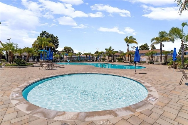 19859 Claremont Ln, Huntington Beach, CA 92646 - community pool with a patio