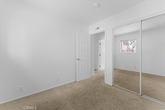 19859 Claremont Ln, Huntington Beach, CA 92646 - unfurnished bedroom with carpet floors and a closet
