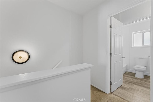 19859 Claremont Ln, Huntington Beach, CA 92646 - bathroom with toilet and baseboards