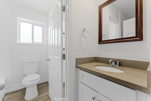 19859 Claremont Ln, Huntington Beach, CA 92646 - bathroom featuring vanity and wood finished floors
