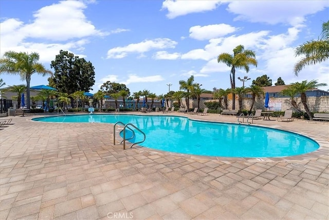19859 Claremont Ln, Huntington Beach, CA 92646 - community pool featuring a patio