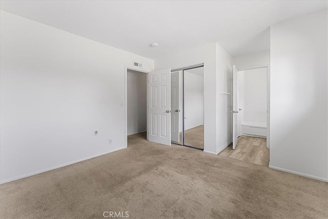 19859 Claremont Ln, Huntington Beach, CA 92646 - unfurnished bedroom featuring carpet and a closet